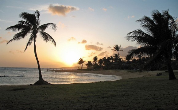 Poipu Beach at sunset by Flickr user skyler miller (creative commons)